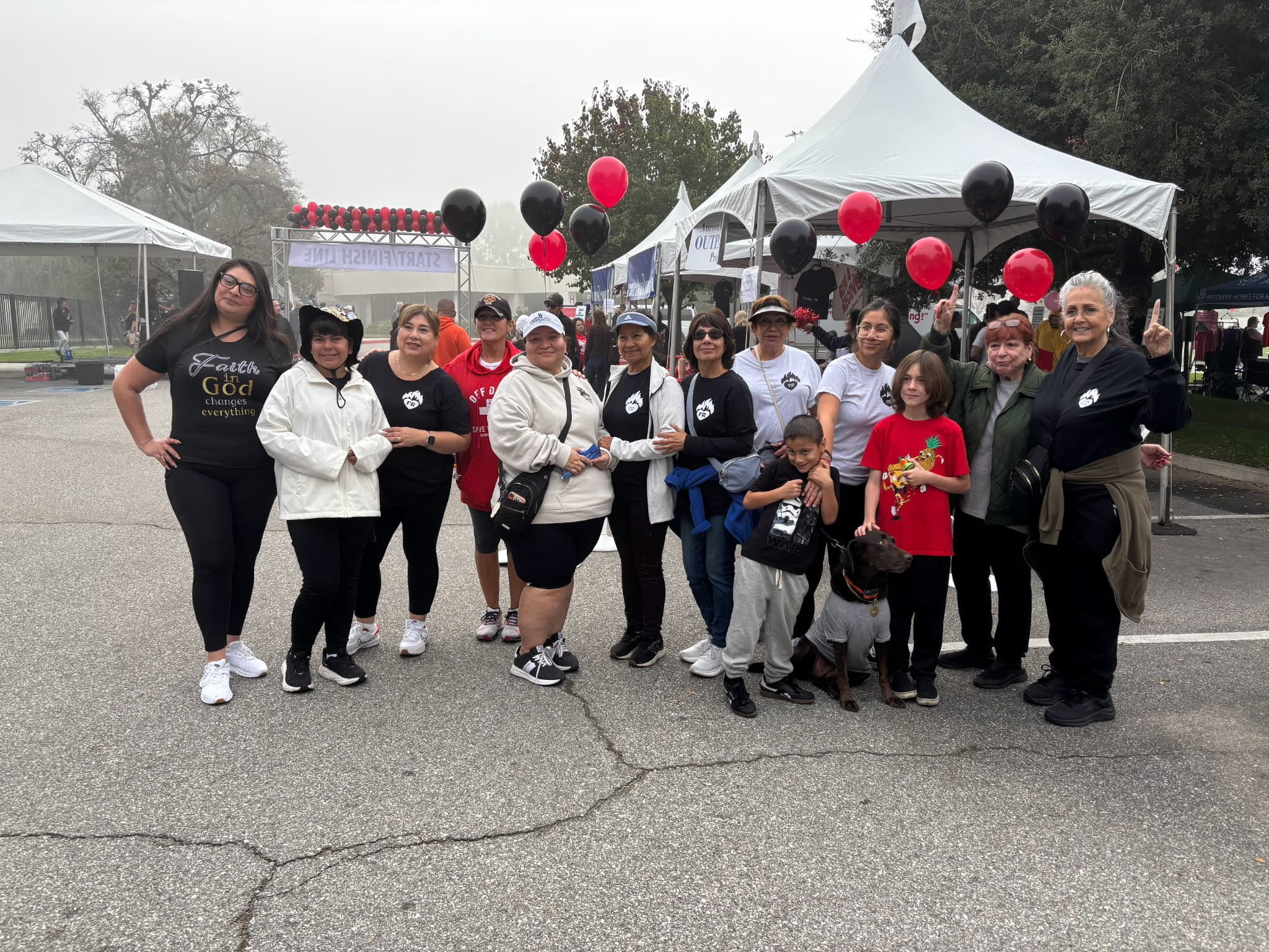 Large group of individuals in recovery gathered together in community support